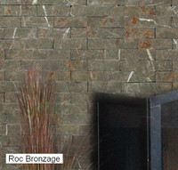 Roc Bronaze split face 1 x 3 tiles, on 12" x 12" mesh backing.  Dark tan, white and rust coloring.
