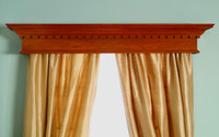 The Plymouth custom wood cornice with dentil.