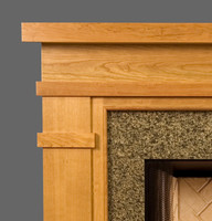 Details of the Craftsman Bridgewater fireplace mantel include clean horizontal lines.