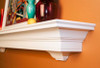 Lynlee shelf has decorative corbels attached
