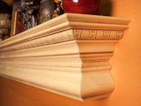 The moldings wrap around the ends, returning to the wall