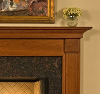 The Franciscan has fluted legs with crown molding under shelf.
