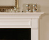 The detailed framed across the header of the mantel gives the Fredricksburg mantel a unique look.
