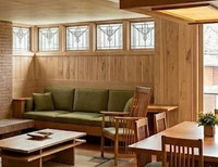 The Natural Birch 9 groove paneling surface has a soft, matte or low-satin appearance rather than a high-gloss sheen. This allows the natural depth, shifting golden-brown hues, and organic texture of the wood to remain the focal point under the direct light from the skylight. 