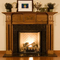This mantel surround is available in six wood species (including Oak) and various factory finish options.