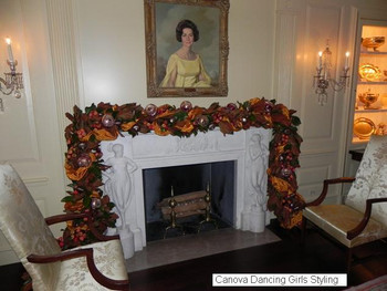 Three versions of this neoclassical white limestone mantel are in the White House Vermeil, China and Yellow Oval rooms.