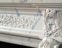 French marble mantel with classic design elements.