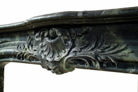 The detail on this Louis XIV marble mantel is phenomenal