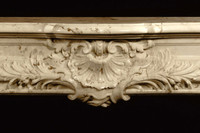 Center of the Fontaine marble mantel in ribera brown