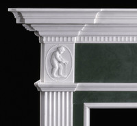 The Great Britain has cherubs on each end of header (you may special order this mantel without cherubs)