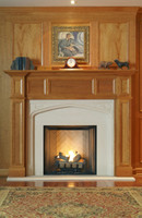 The Oxford mantel surrounds our Hampton Court Limestone mantel in this image
