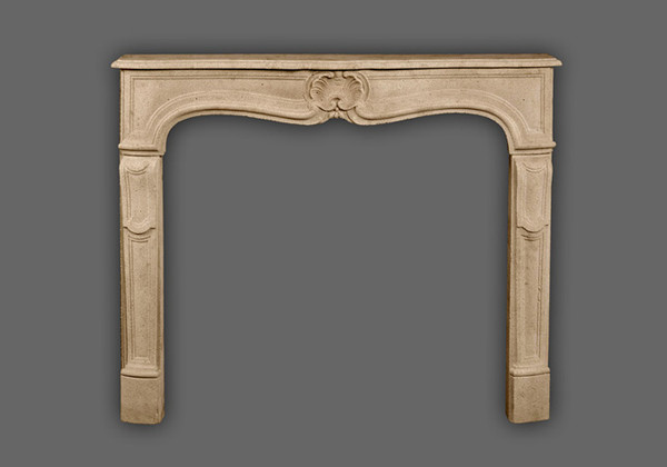 The Provence marble mantel has a beautiful shell design in the center