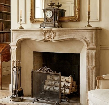 Embracing the rustic elegance and understated luxury of the French countryside, this Louis XV Provincial style mantel The Provence, is a masterclass in texture and form. Sculpted from a warm, beautifully textured limestone with a soft sand-toned finish, it brings a tactile, organic warmth to any high-end interior. Stripping away the heavy gold or stark white of formal city salons, this piece celebrates the fluid curves of the Rococo era through a relaxed, old-world lens.