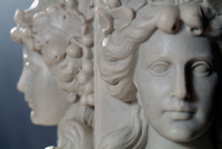 Caryatids have no veining touching the delicate faces in this Marble Mantel