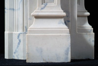 This marble mantel has detaile down to the floor