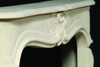 The arches in this Louis XV marble mantel are architecturally accurate