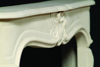 The arches in this Louis XV marble mantel are architecturally accurate