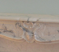 The Savoy #115 Louis XV Style marble mantel.  Carrara