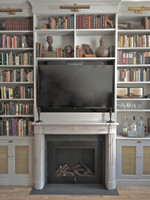 The clean line style of the French marble mantel expands the space in this Manhattan apartment