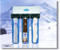 8 Stage Water Filtration:

Stage 1: Water flows through a 20" sediment filter cartridge that removes sediment, silt, sand and dirt. Also extends the life of the water filters

Stage 2: Water flows through one - micron filter pads (1 micron equals 1/25,000th of an inch), which remove suspended particles such as silt, sediment, cyst (Giardia, Cryptosporidium), sand, rust, dirt, and other un-dissolved matter.*

Stage 3: Water flows through granulated activated carbon (GAC). GAC is universally recognized and widely used as an effective adsorbent for a wide variety of organic contaminants, such as chlorine (99.9%), chemicals linked to cancer (THM's, benzene) pesticides, herbicides, insecticides, volatile organic compounds (VOC's), PCB's, MTBE's and hundreds of other chemical contaminants that may be present in water that create bad taste and odors.*

Carbon is extremely porous and provides a large surface area for contaminants to collect. Carbon-only filters must also use their capacity for chlorine removal, resulting in a shortened life. They also may use a bituminous coal carbon, which is good at removing chlorine, but not as effective at removing chemicals. We use a high-grade coconut shell carbon that is most effective at removing chemicals. Coconut shell carbon provides a significantly higher volume of micro-pores than either coal, wood or lignite based carbon. As a result, it is more effective than other carbon types in removing trihalomethanes (THM's) and other chemicals from municipally supplied water. Since our REDOX media removes the chlorine before it reaches the carbon, the carbon capacity is not wasted on chlorine and is free to concentrate more effectively on organic contaminants.

Stage 4: Water flows through ceramic balls, removes harmful bacteria such as E. Coli, Fecal coli form, Salmonella, Streptococcus, and cysts (Cryptosporidium, Giardia) and sediment.

Stages 6 and 7: Water flows through a bed of media made of a special high-purity alloy blend of two dissimilar metals - copper and zinc (Eagle Redox Alloy® 6500, and Eagle Redox Alloy® 9500). Eagle Redox Alloy® is a major advancement in water treatment technology that works on the electro-chemical and spontaneous-oxidation-reduction (REDOX) principles. Chlorine is instantaneously and almost inexhaustibly oxidized.  

Tests on Eagle Redox Alloy®/GAC cartridge have shown 99+% chlorine removal past 20,000 gallons of water. In comparison, carbon cartridges of comparable volumes drop below 90% effectiveness after only 4,000 gallons.

Iron and hydrogen sulfide are oxidized into insoluble matter and attach to the surface of the media. Heavy metals such as lead, mercury, copper, nickel, chromium, cadmium, aluminum, and other dissolved metals are removed from the water by the electrochemical process. They are attracted to the surface of the media, much like a magnet. The media inhibits bacterial growth throughout the entire unit. In fact, it has been shown to be reduced up to 90%, eliminating the need for silver, which is commonly used in  carbon-only filters (silver is considered a pesticide by the EPA and, as such, must be registered with them). Is copper or zinc added to the water in any significant amount? On 2.3 ppm chlorinated water, <0.05 mg/l copper and only 0.46 mg/l zinc were measured. The EPA aesthetic levels are 1.0 mg/l for copper and 5.0 mg/l for zinc. Both zinc and copper are essential minerals for good health - the FDA recommends a daily intake of 15 mg of zinc and 2 mg of copper.

Stage 7: Water flows through another one-micron filtration pad for further reduction of undesirable particles. The end result is a great reduction or the total elimination of a wide variety of contaminants.

Stage 8: Water flows through a 20" solid carbon cartridge for removing volatile organic carbon compounds (VOC's, insecticides, pesticides and industrial solvents).*   

* If present in your water.