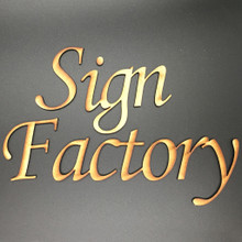 Letter connected MDF Letters spelling Sign Factory in the Monotype font.  These letters are made from 1/8" thick MDF and, with the exception of the 1st capital letter,  pushed together to form one solid design.