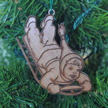Sledder Boy on a Runner Sled -  Laser Engraved and cut from Cherry.