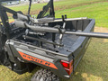 Holds two long guns of any kind or one bow and a log gun