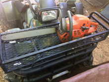 Our new ATV baskets have tie down handles to secure items from coming out on rough terrain driving. This is a 2002 Honda Foreman the basket is on.