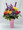 Brighten their day with a stunning combination of seasonal floral