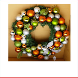 Decorated Christmas Wreath Contemporary style by our team of designers at Father Christmas tailored to your colour theme and expectations. Contact us by email info@fatherchristmas.net.au or ph: 1300 455 298 for an extensive Quote on your requirements.