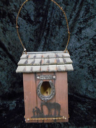 PRAYING COWBOY BIRD HOUSE