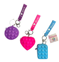 MD2452 Pop It Coin Purse

$2.60 plus GST

Our Pop It Coin Purse is a bit of fun and oh so handy as well!  Perfect for Mums spare change!  Approx. size of products 8.5 x 7.5 x 3cm.  New design.

Product Info: a silicone coin purse with zipper and strap, that has “pop it” buttons to press.  3 new shapes and colours: pink: love heart, blue: rectangle, purple: round.