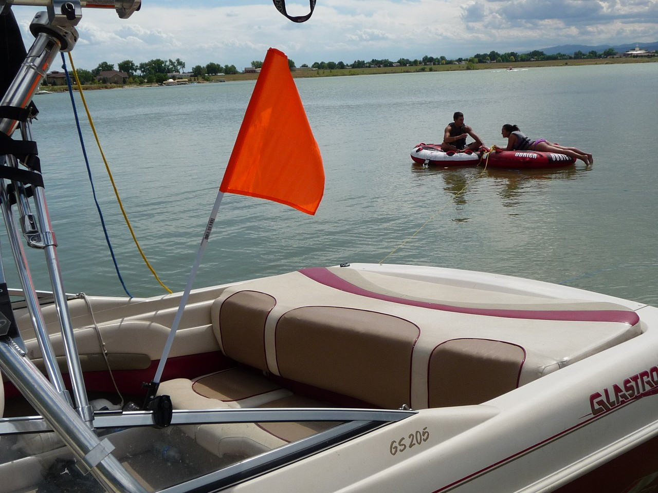 Pontoon Boat Flag Holder. Orange Safety Flag Included. Tired of Holding The Skier Down Flag? Just Clamp The Flag Buddy to Your Boat and Rotate It Up