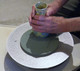 Polishing ad in use.  Just place the pad on to the steel diamond grinding disc and it will automatically attach to it with the rubber magnetic backing. 