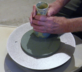 Polishing ad in use.  Just place the pad on to the steel diamond grinding disc and it will automatically attach to it with the rubber magnetic backing. 