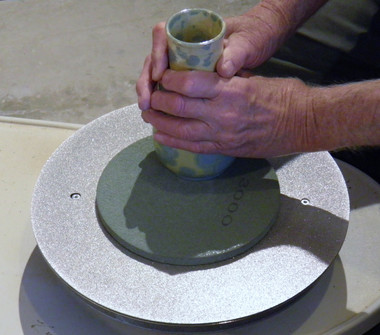 Polishing ad in use.  Just place the pad on to the steel diamond grinding disc and it will automatically attach to it with the rubber magnetic backing. 