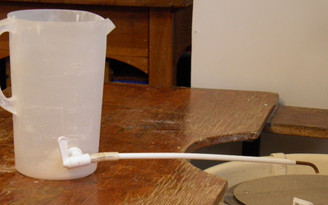 Water drip spigot adjustabvle  with 15" plastic/copper tube.