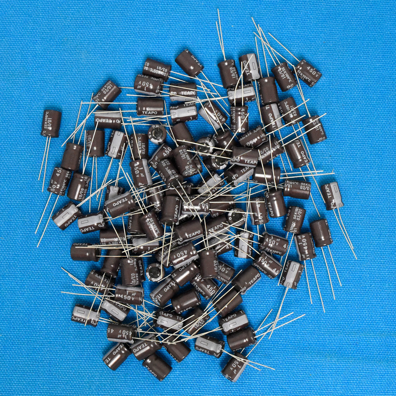 {100 pcs} 1uf 450V SE45DMIRDDKT9 Radial Lead Electrolytic Capacitors