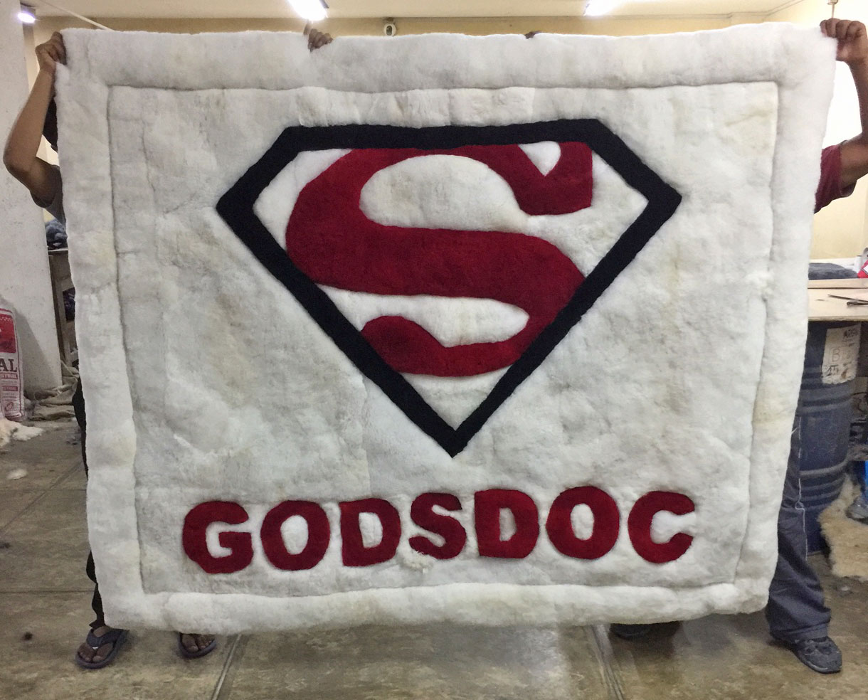 Custom Superman Alpaca Rug in our Facility in Lima>