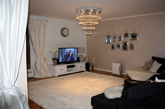 Custom white alpaca rug in living room side view