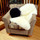 Jumbo Single-Pelt Sheepskin Throw in Ivory on Easy Chair
