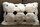Closeup of White Puffs Alpaca Pillow with Black Diamond Accents