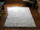 White Sheet Alpaca Fur Rug on Wood Floor
