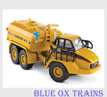 Norscot 55141 HO Scale 1:87 Caterpillar(R) Cat 730 Articulated Truck w/Klein Water Tank - Assembled