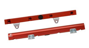 Aeromotive High Flow, Billet Fuel Rails combine 3,000 HP flow capabilities with “bolt-on” ease of installation.

• Fits GM LS3/L76 - Rails Only
• ORB-08 Ports with compact connections and positive, leak-free sealing.
• Full 5/8” ID through bore, capable of supporting up to 3,000 HP.
• Fully compatible with -10 AN line if combined with custom ORB-08/AN-10 adapter P/N 15641.
• Full size ports at each end for optimal injector supply and minimal hydraulic fluctuation.
• Additional inlet/outlet ports are provided where required for plumbing convenience.
• CNC-machined, billet aluminum construction for unequaled fit and finish.
• Steel mounting brackets, custom engineered for each application, combining a solid, durable mounting platform with correct fit and “bolt-on” ease of  nstallation.
• Red, Type II bright dip anodized finish that looks great and protects against corrosion.
