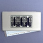 Retro Art Deco checks holder with black aluminum behind the design.