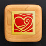 Gold heart engagement ring box with red accent behind the design.