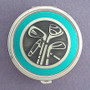 Golfing round pill case - silver with teal aluminum