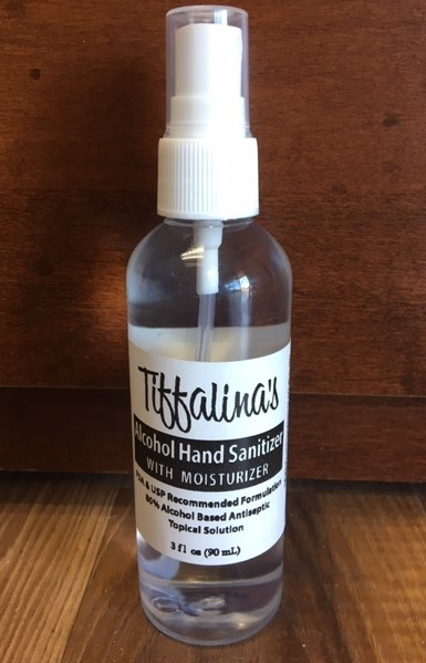 Spray hand sanitizer bottle. Easy to use and dries fast.