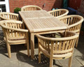 rectangular table with banana arm chairs  |C&T Teak | Sustainable Teak Garden Furniture |Southwold Suffolk